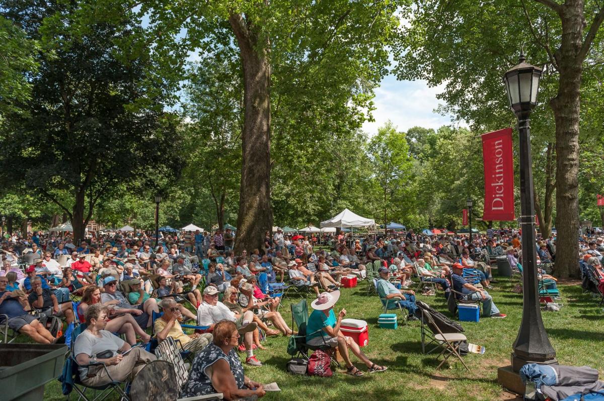 Thousands stick through the rain at annual bluegrass festival