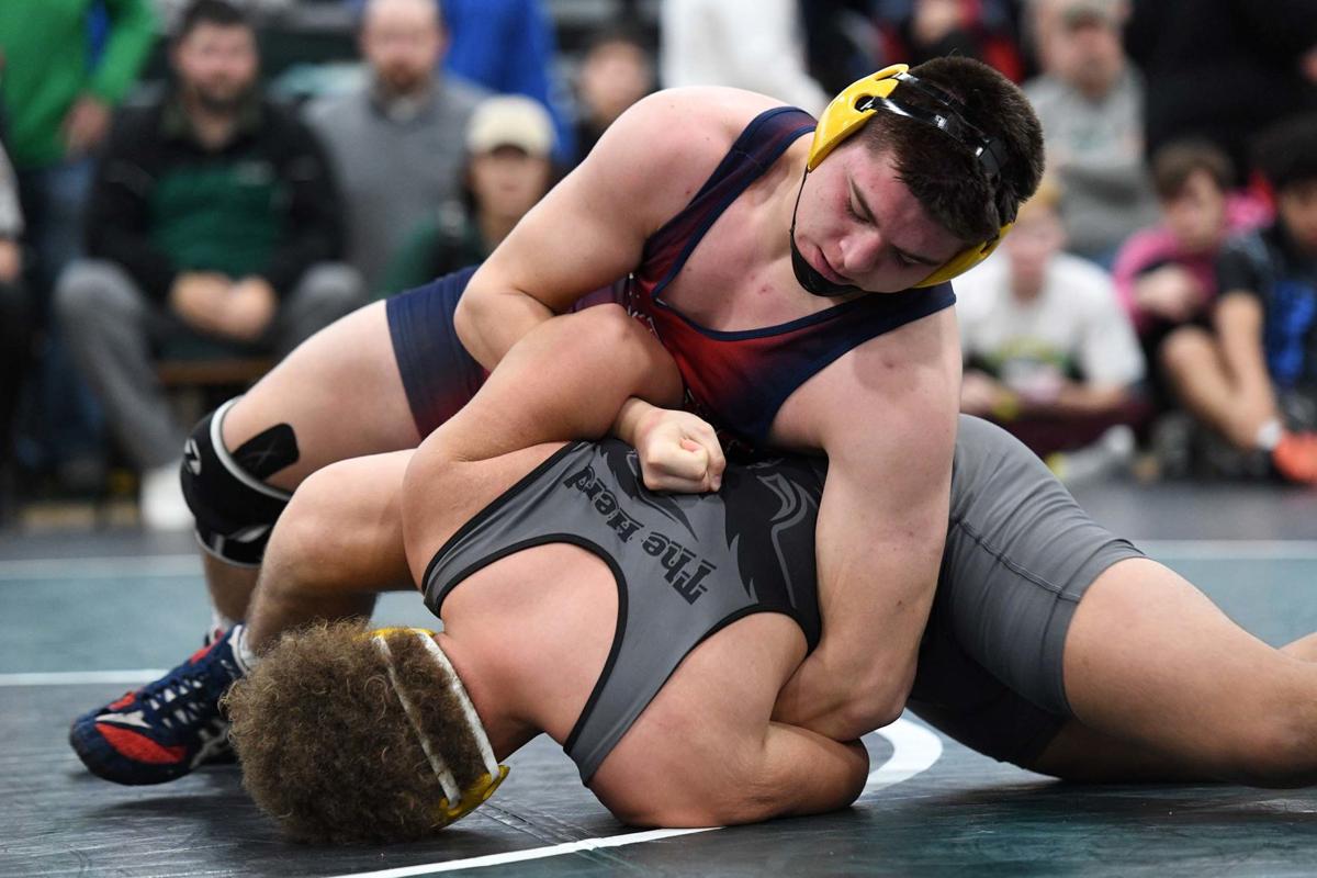 HS Wrestling Colton Zimmerman, Sean Smith win golds; Carlisle claims