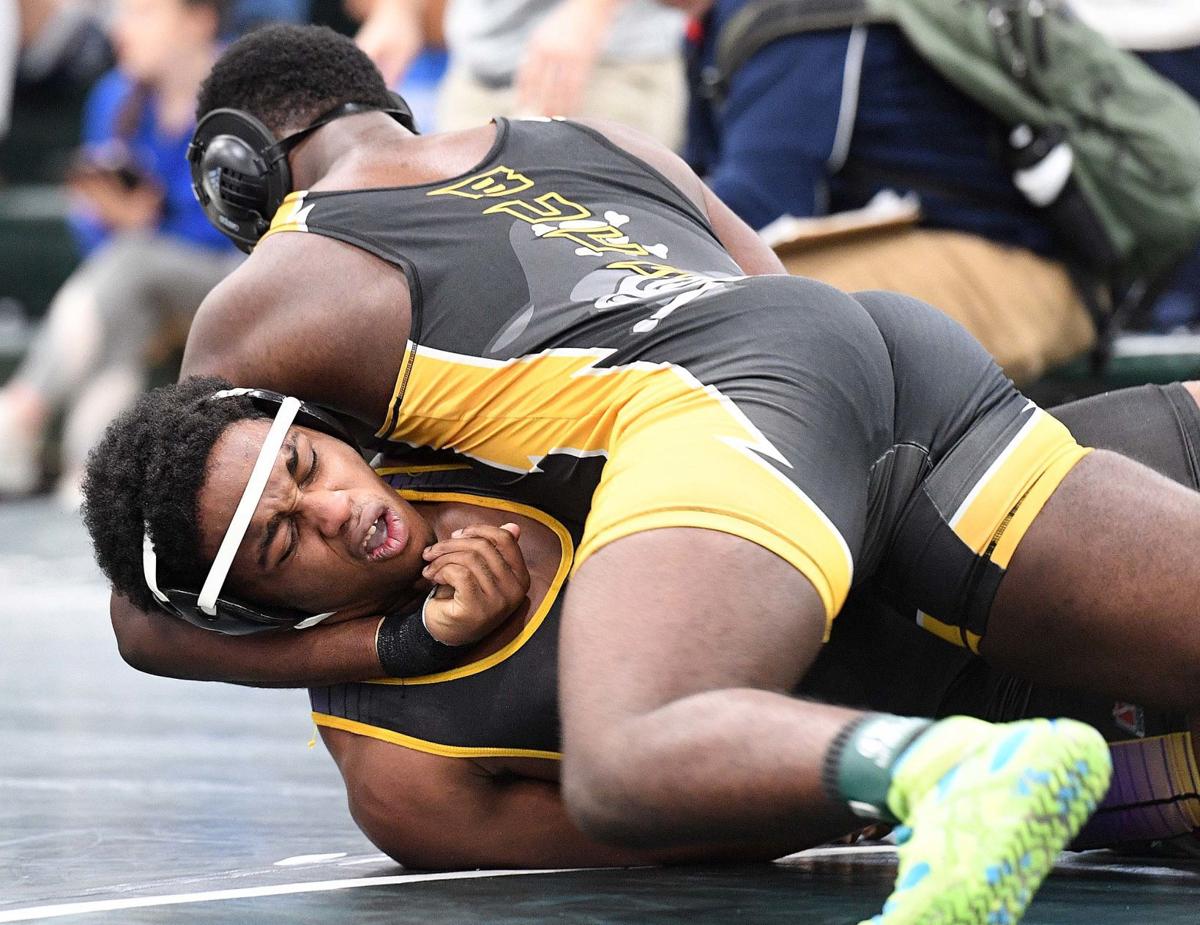 HS Wrestling Colton Zimmerman, Sean Smith win golds; Carlisle claims
