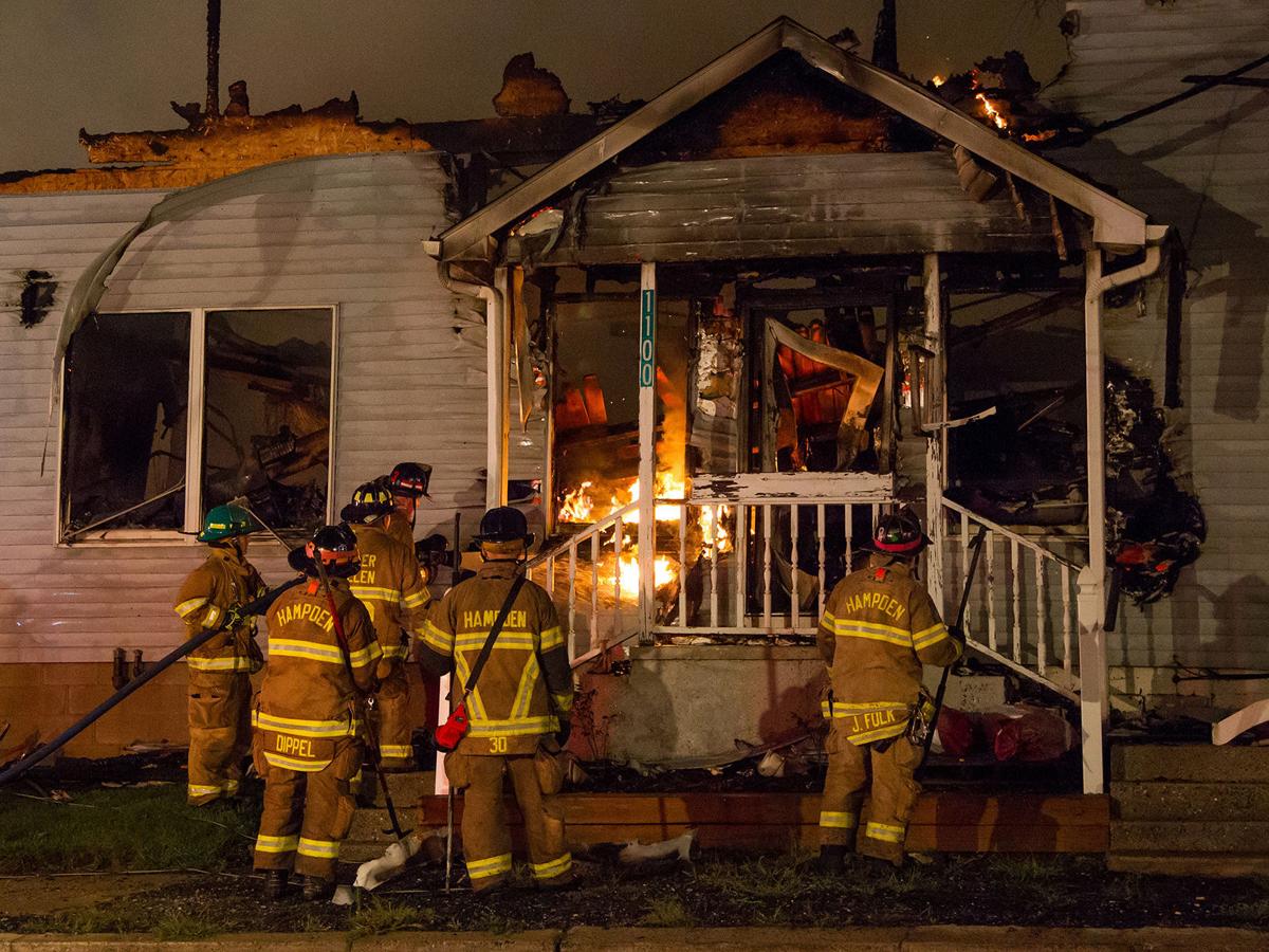 Massive fire consumes lumber yard, burns through the night The