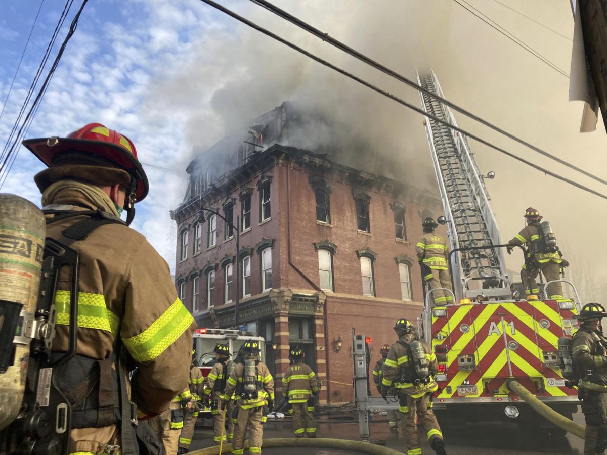 Pittsburgh building burns, partially collapses