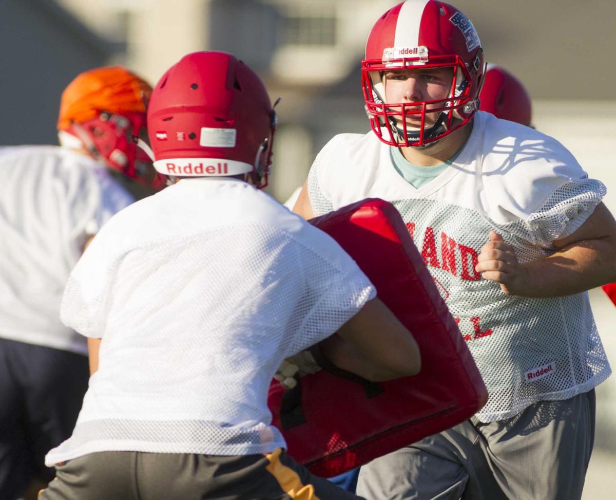 Photos Red Land football practice during heat acclimation week