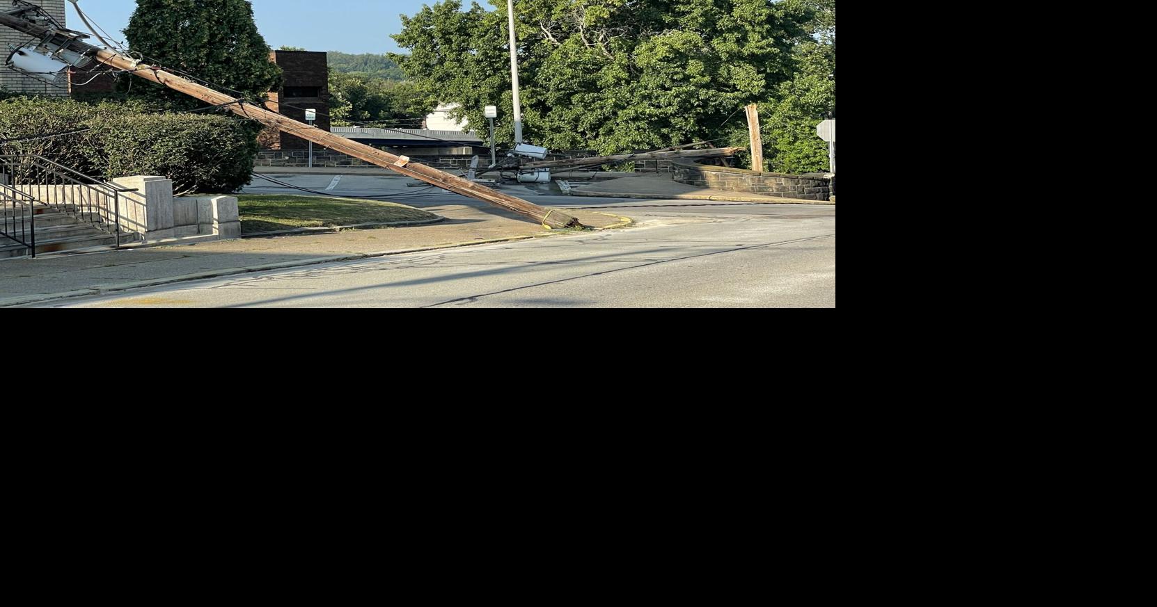 Garbage truck takes down poles | News | dailycourier.com
