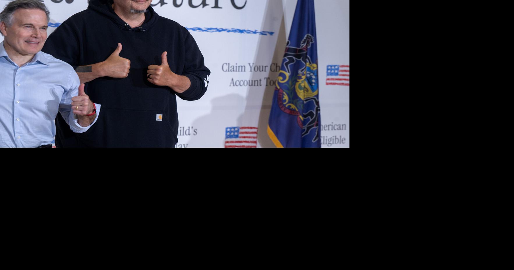 Pennsylvania's U.S. Senators Dave McCormick, left, and John Fetterman appear together on June 29, 2026, to promote the savings accounts for kids that were a signature piece of President Donald Trump's Big Beautiful Bill.
