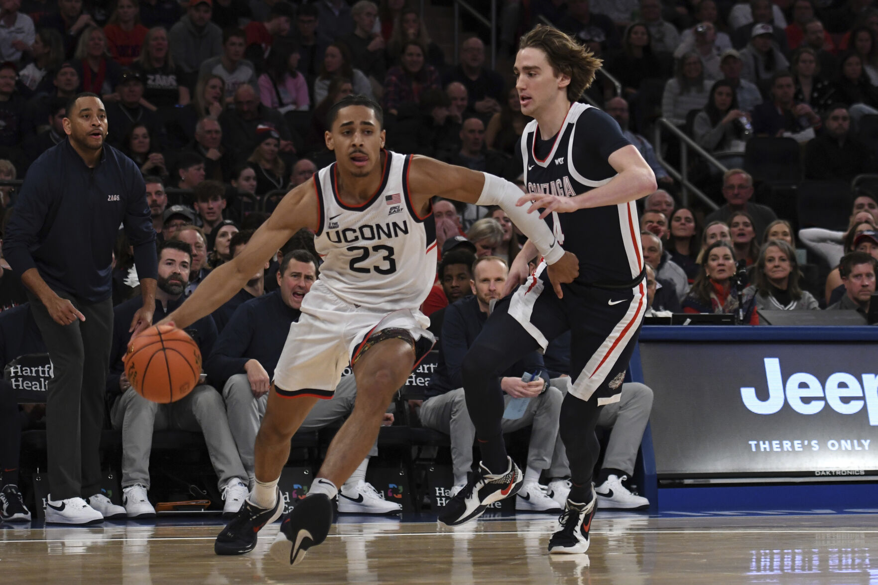 McNeeley Lifts No. 18 UConn Past No. 8 Gonzaga 77-71 | Sports ...