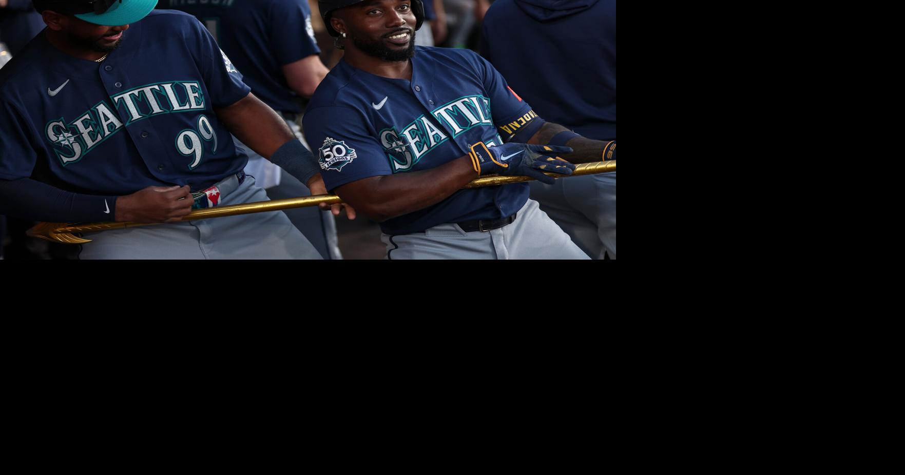 Mariners pound Athletics 19-1 with 5 home runs, 23 hits