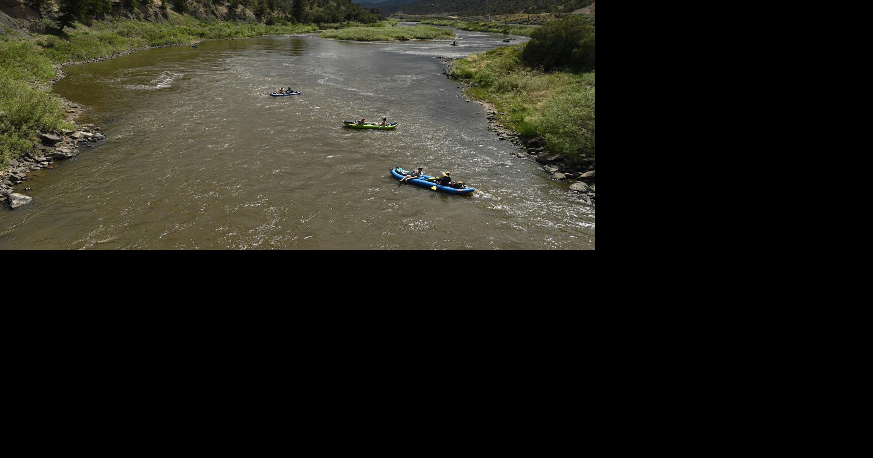 People float the Colorado River near the State Bridge on July 2, 2022, in Bond, Colorado.