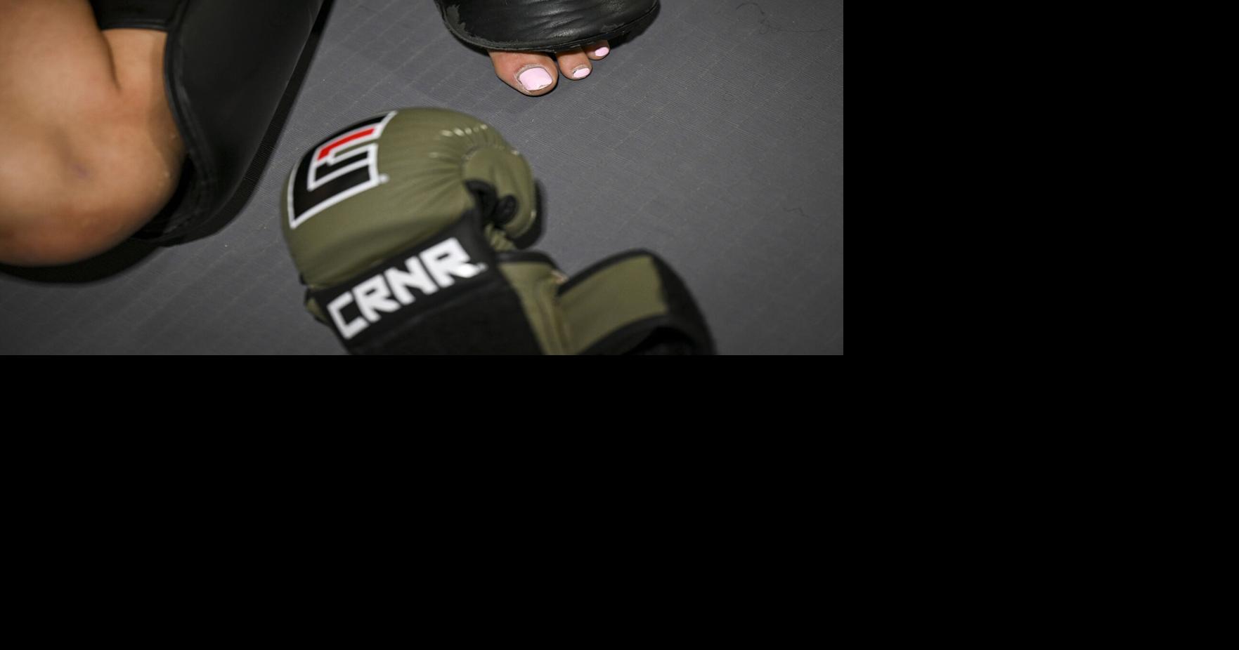 UFC fighter Alex Apodaca rests during a training session at Tiger Beetle Martial Arts in Centennial, Colorado, on Sept. 9, 2026.