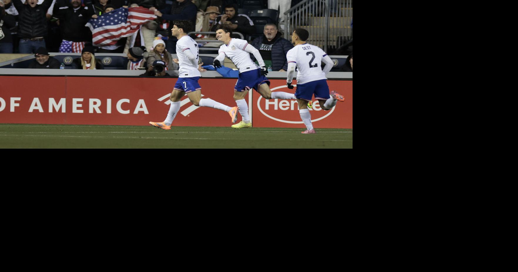 The United States' Gio Reyna, left, celebrates with teammates after scoring against Paraguay in an international friendly at Subaru Park in November 2025 in Chester, Pennsylvania.