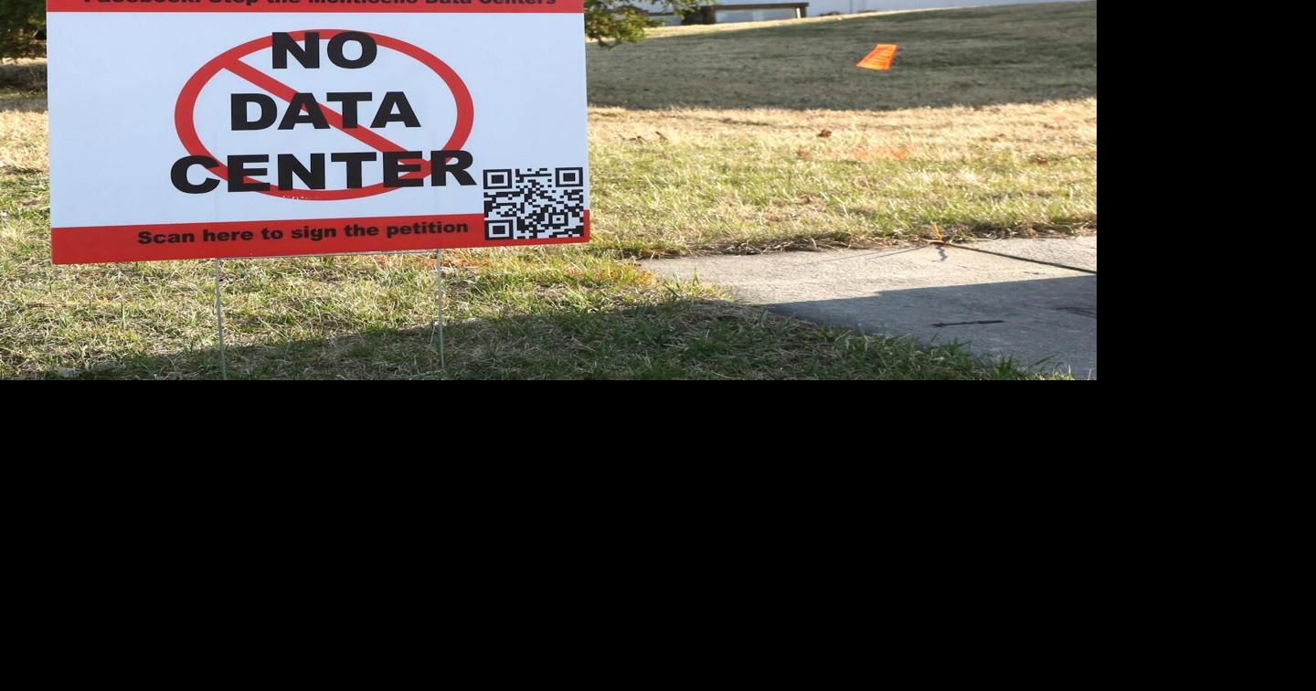 Residents near a proposed data center display in Monticello, Minnesota, display lawn signs protesting the project.