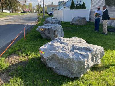 Boulders to protect home against speeding cars on Kings Road