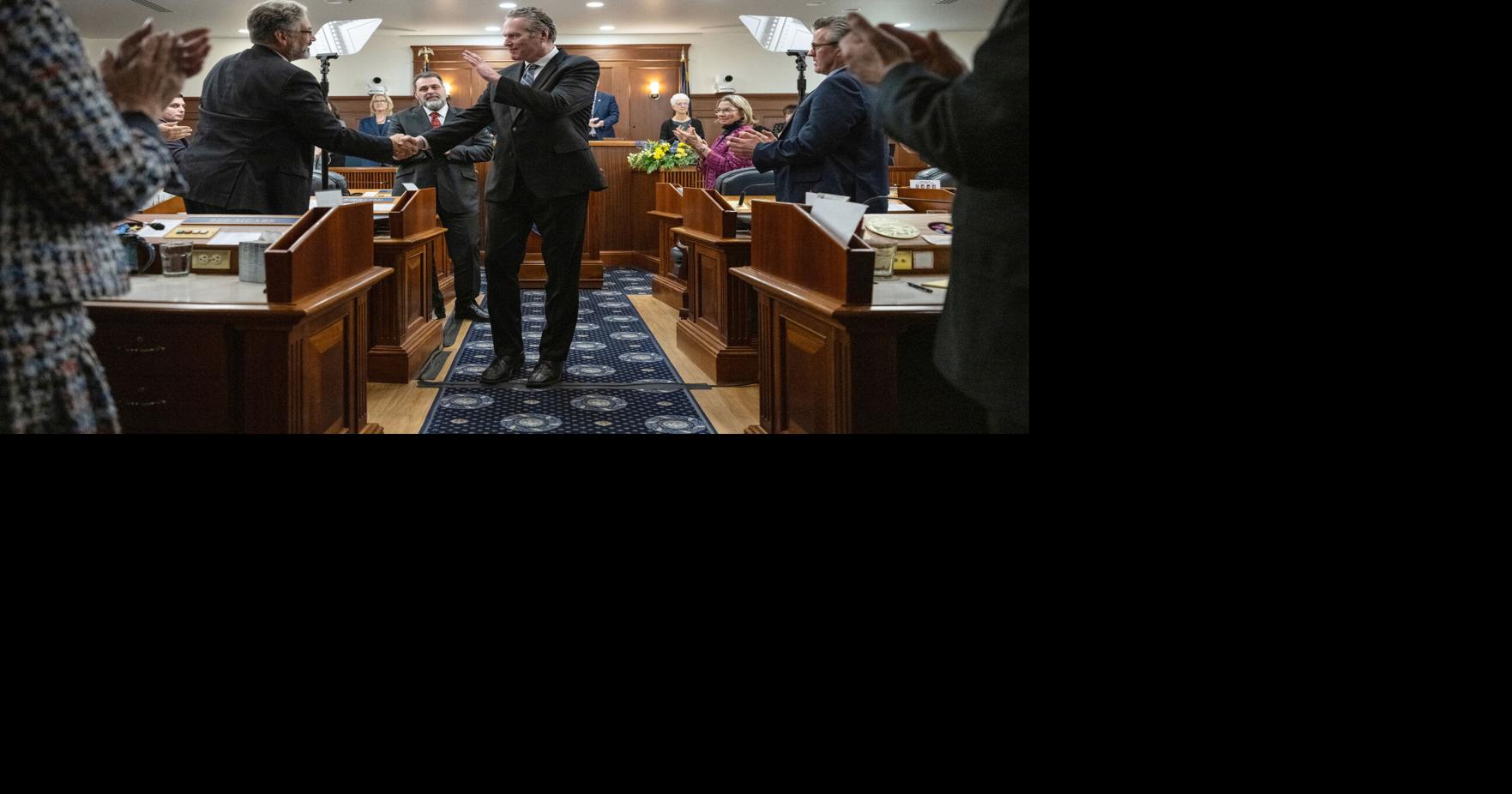 Mike Dunleavy exits the state House of Representatives chamber after gaving his last State of the State address to a joint session of the Alaska Legislature in Juneau, Alaska, on Jan. 22, 2026.