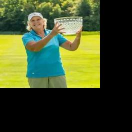 Karen Feldman with crystal bowl trophy
