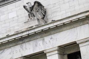 Fed cuts rates with three dissents, projects one cut in 2026