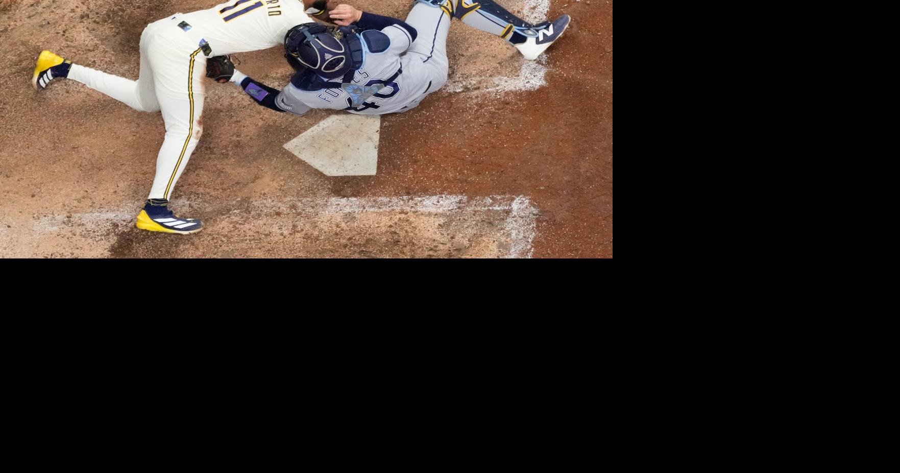 Photos of the Brewers and Rays battling for their first World Series ...
