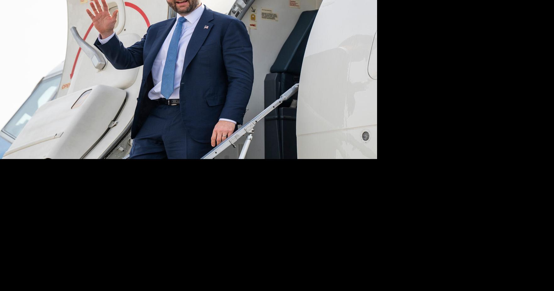 Vice President JD Vance exits Air Force Two after arriving at MBS International Airport in Freeland, Michigan, on March 14, 2025.