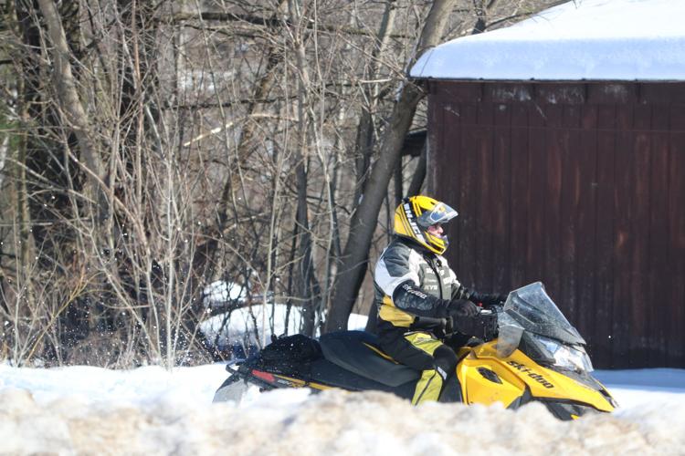 Mayfield snowmobiler on southern Adirondack trail