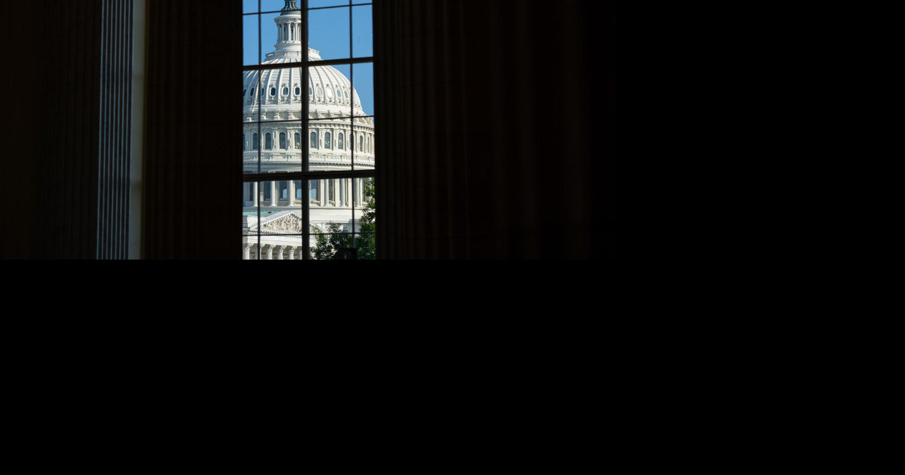 The U.S. Capitol dome is seen through a window in the Cannon House Office Building rotunda on Wednesday, May 20, 2026, in Washington, D.C..