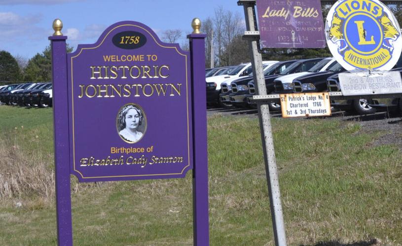 New Welcome to Johnstown sign featuring Elizabeth Cady Stanton