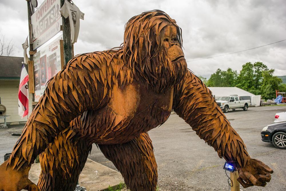 A missing Sasquatch statue was just found alone in the woods