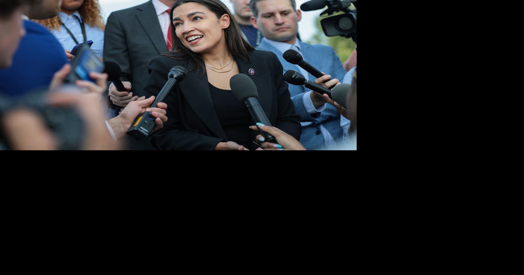 Alexandria Ocasio-Cortez speaks to reporters near the House steps after a series of votes at the U.S. Capitol on July 22, 2026, in Washington, D.C..