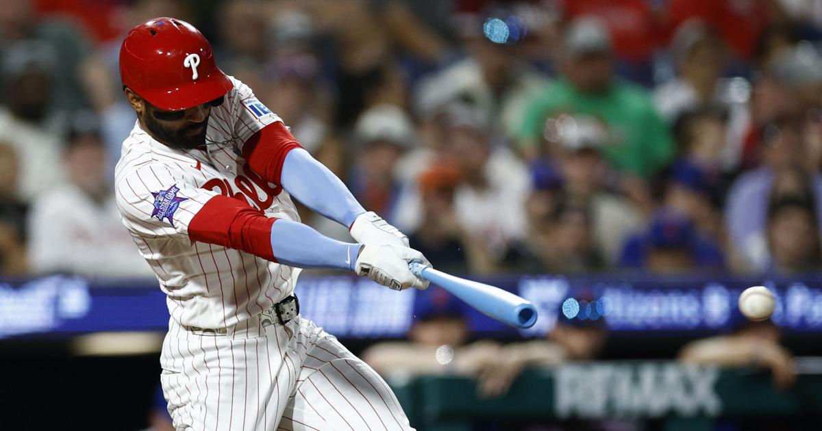 Philadelphia Phillies' Derek Hill belts a sixth-inning single against the New York Mets on Sunday, June 21, 2026, at Citizens Bank Park in Philadelphia.