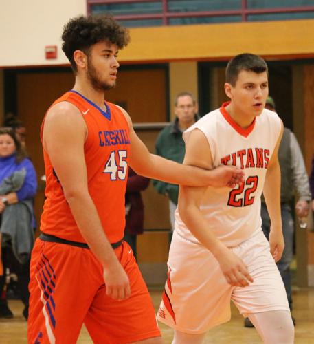 BOYS BASKETBALL: Cats roll over Titans