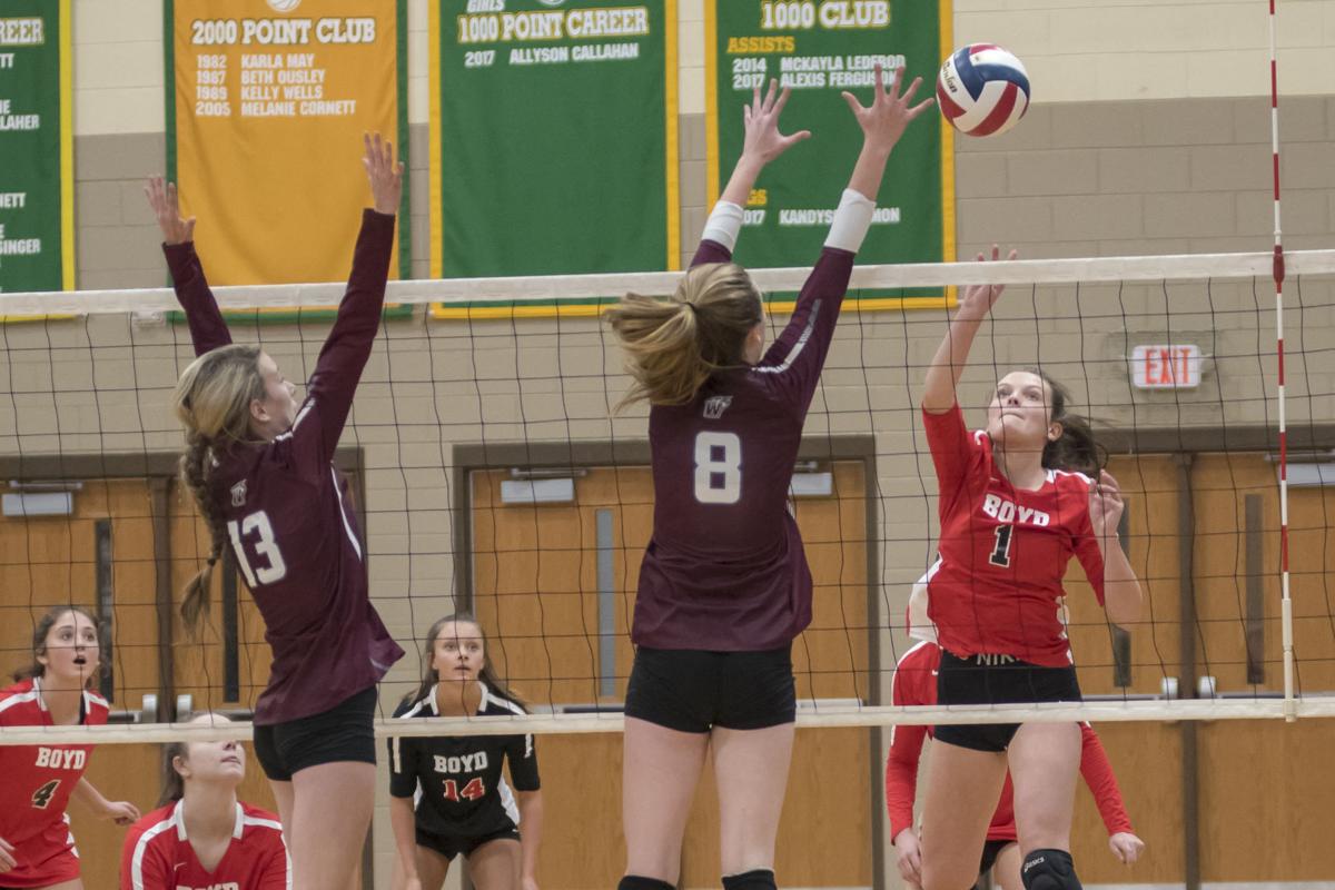 Morgan Lewis looks for a tip past Emily and Madison Adkins.JPG