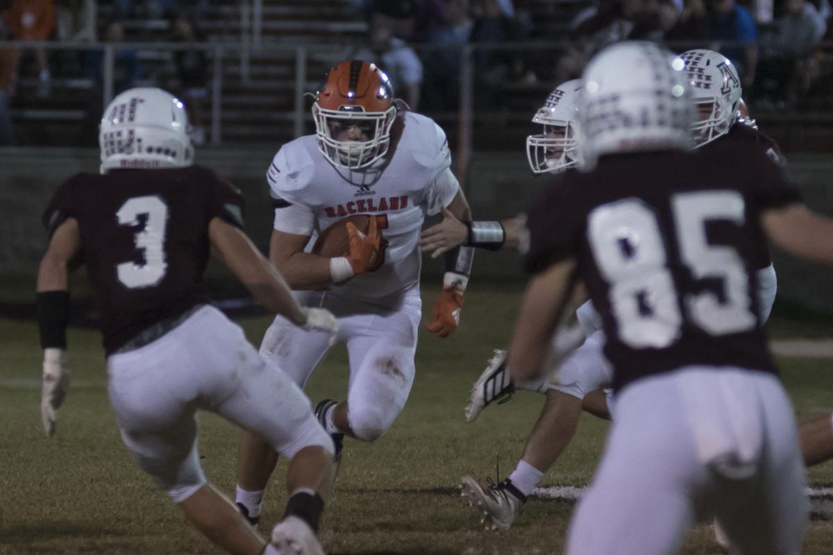Seth Mills races ahead as Caleb Tackett looks to close out.JPG