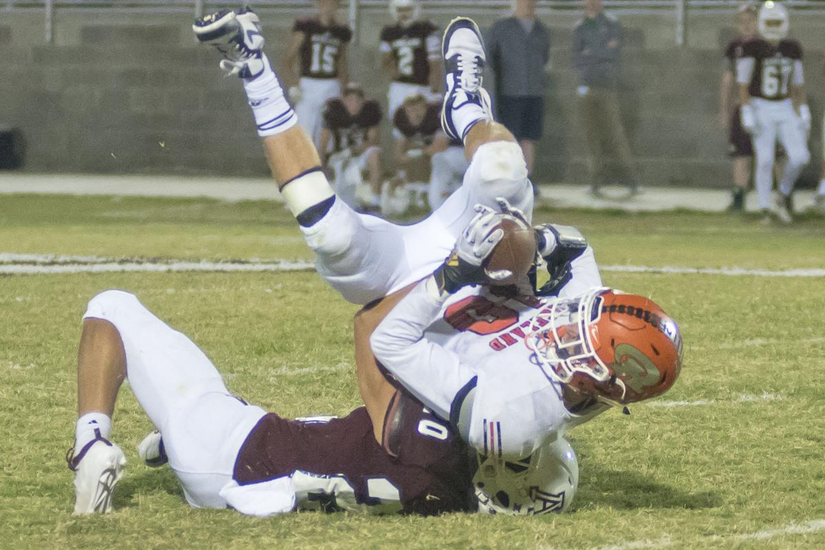 Gunnur Lewis gets up ended by Camron Curtis.JPG