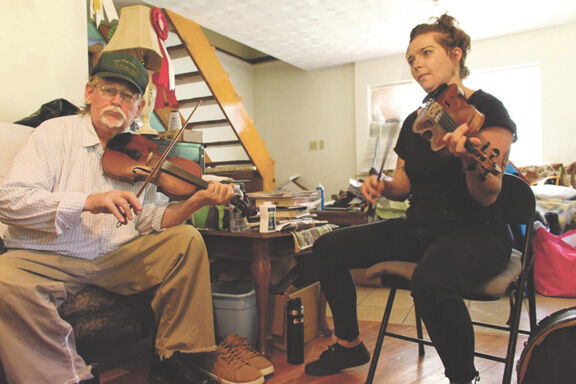 Bowing With The Master Ed Haley Fiddle Contest Winner Named National Heritage Award Winner News Dailyindependent Com Amos morris a pair of golden wings. ed haley fiddle contest winner named