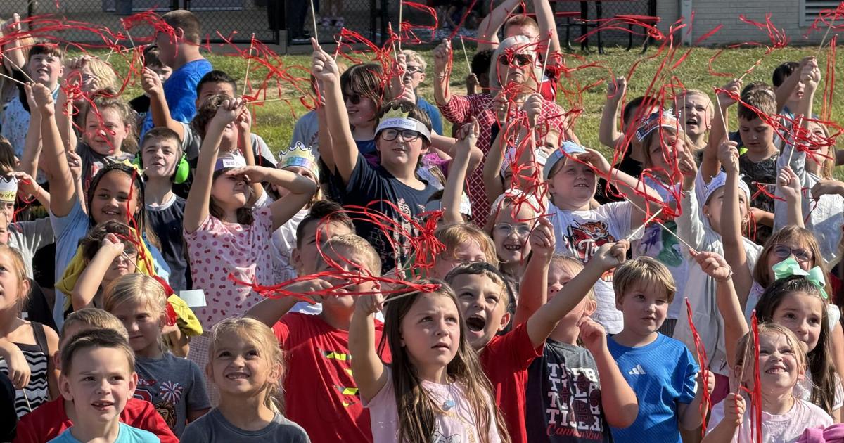 May the Tigers play: Cannonsburg Elementary cuts ribbon on new playground