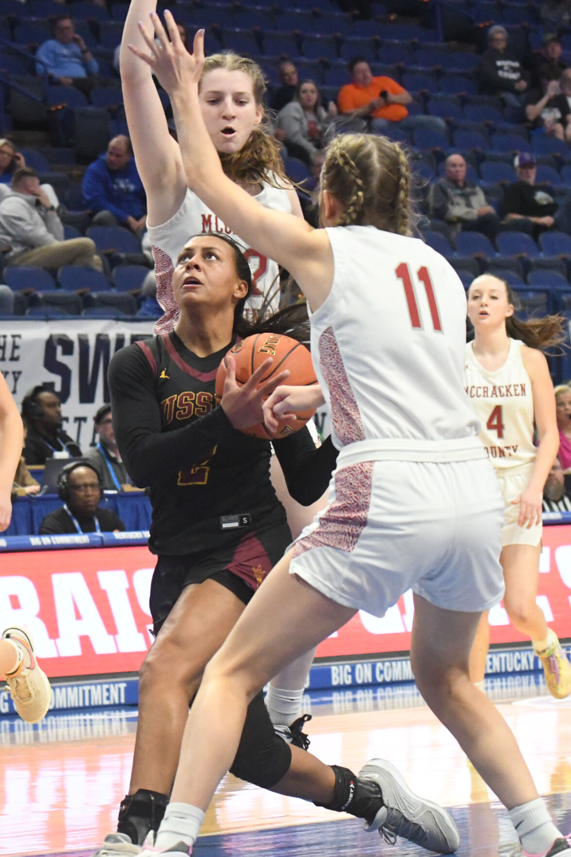McCracken County triumphs over Russell in Girls Sweet Sixteen: Shooting Woes and Foul Trouble Plague Red Devils
