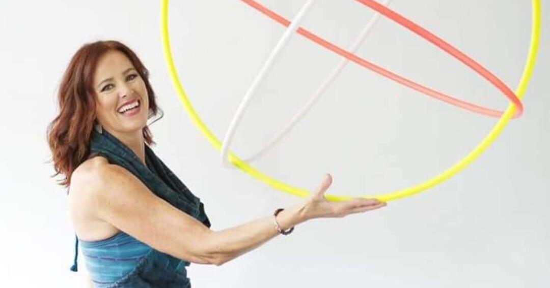 Stretch, rattle and hula: Yoga teacher adds a little hoop to her ...