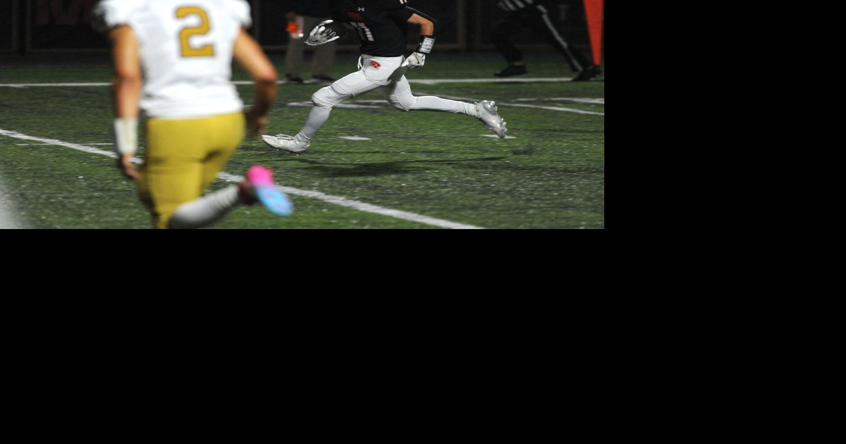 Hazardous on homecoming: Arnett tallies five touchdowns; Rams' defense overwhelms Bulldogs