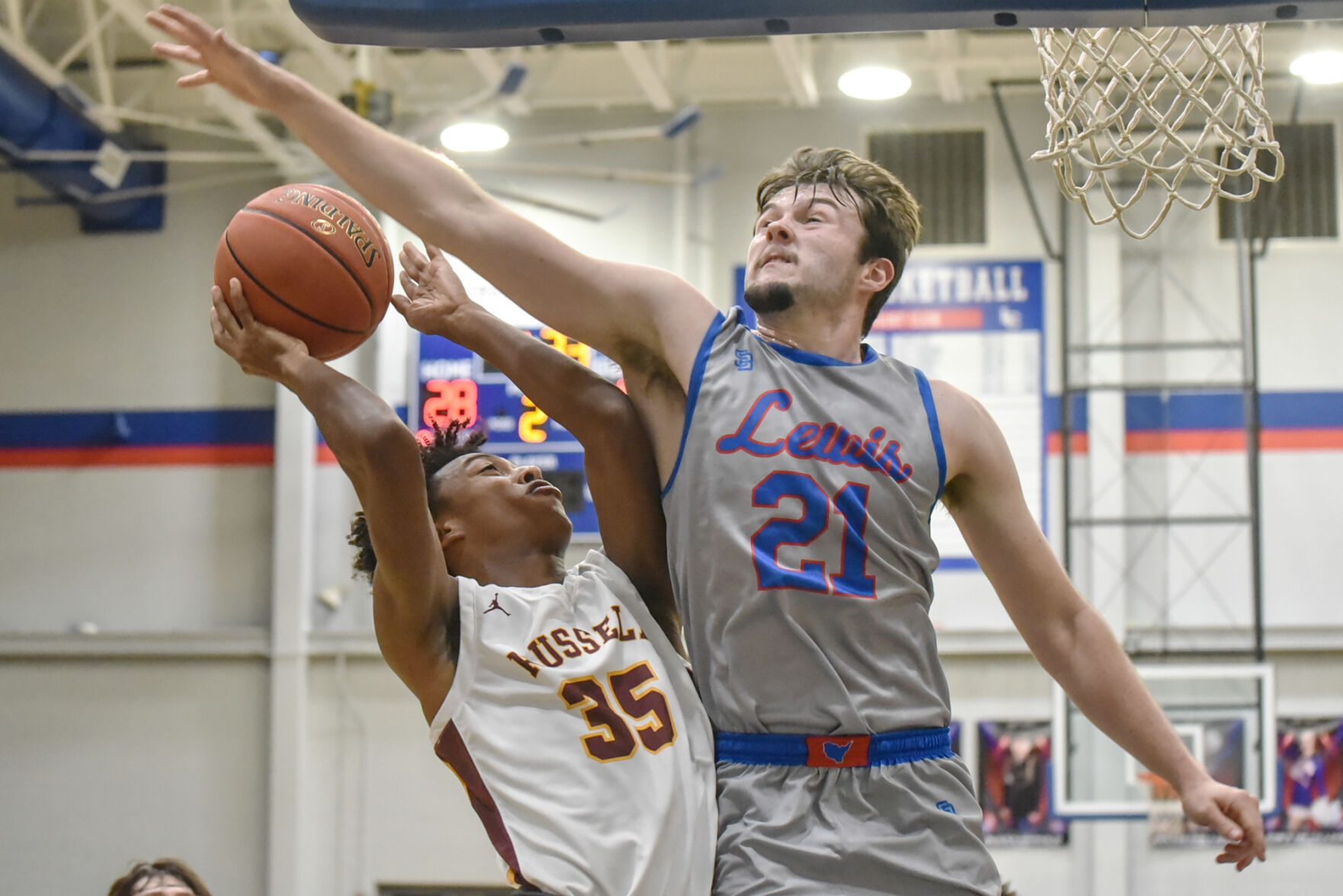 Boys 63rd District final: A jubilant Jungle: Lions handle Russell rally, pull away for win