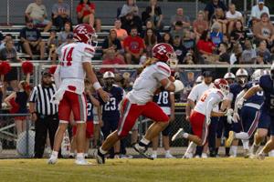Come what May: Junior ignites Lions’ offense: Boyd County holds off Raiders
