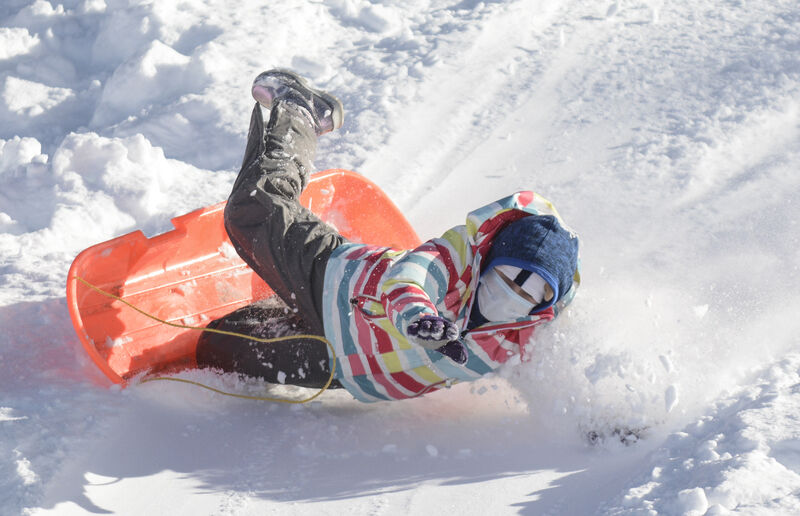 Valley residents sled, shovel after massive snowstorm blankets region