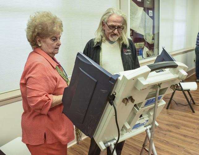 Researchers: Paper ballot voting machines cost far less than alternative