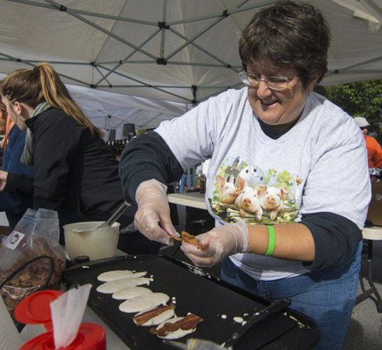 Guests can pig out at McClure Bacon Festival Applause
