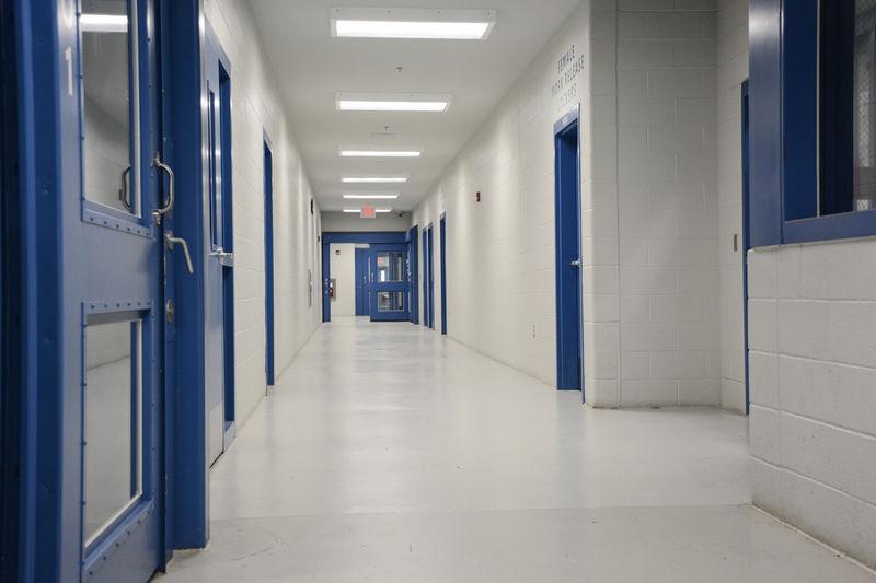 County inmate charged with assaulting two corrections officers News