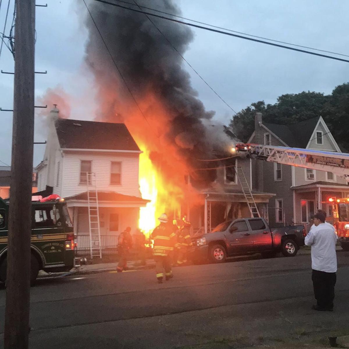 Women lit kerosene, watched houses burn