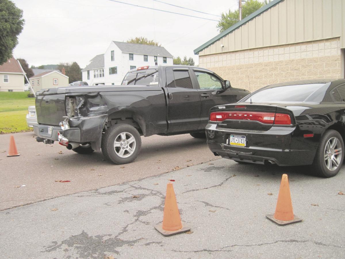 Tractortrailer damages police car, vehicle in hitandrun Local News