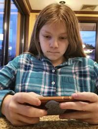Protecting our Children: Parents, experts base phone privileges on maturity, not age