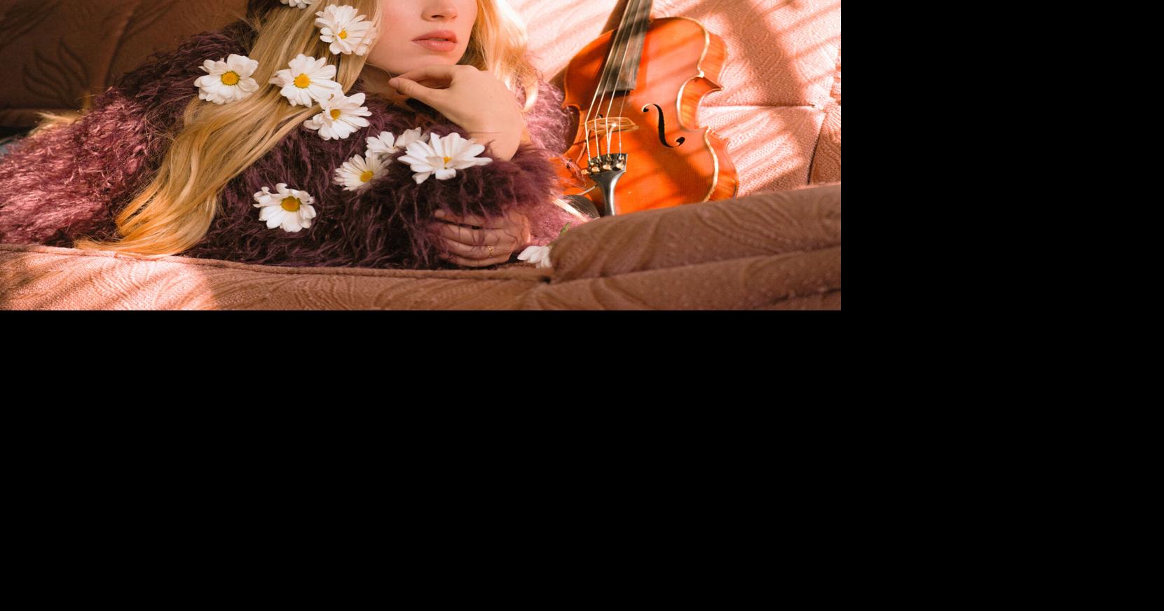 Fiddle player ready to share songs at Weis Center