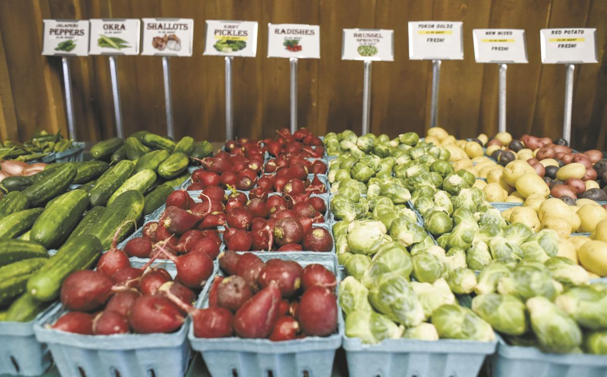 Family returns from missions to open market, greenhouse and garden center Business