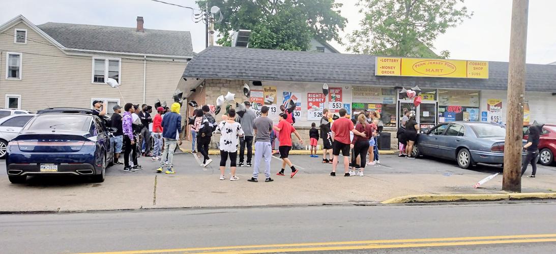 Homicide charges filed in fatal shooting, police seek suspect News