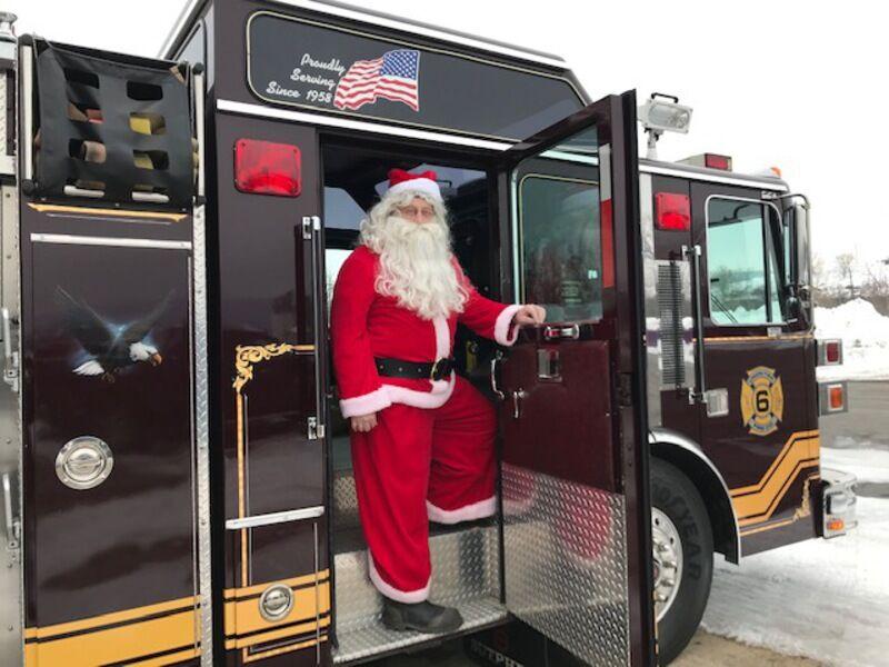 Santa jumps in fire truck, tours Winfield | Neighborhood News