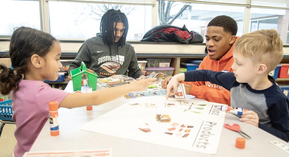 SU basketballl players visit Selinsgrove Elementary class Local News