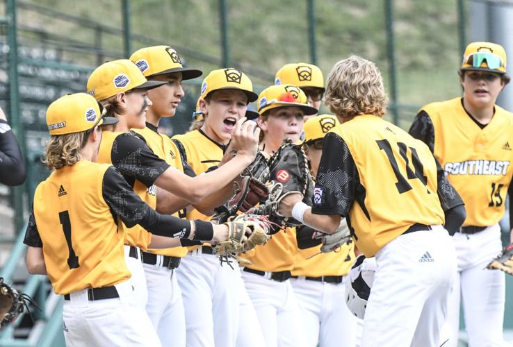 Red Sox enjoy sliding, meeting youth players at Little League Classic